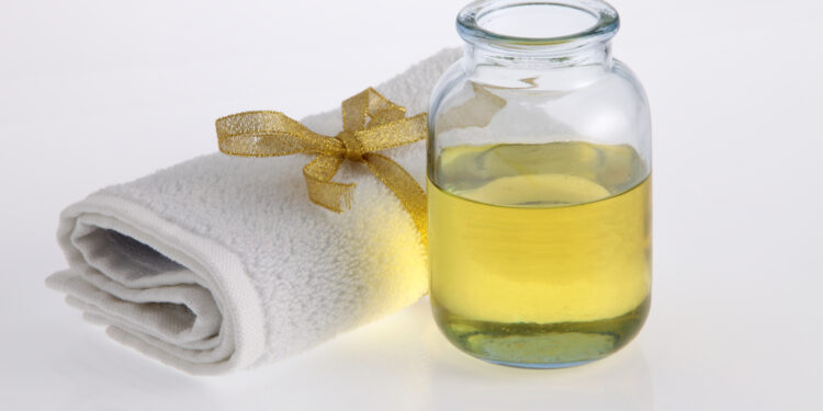 Castor Oil Bottle and Towel - Castor Oil Pack Benefits